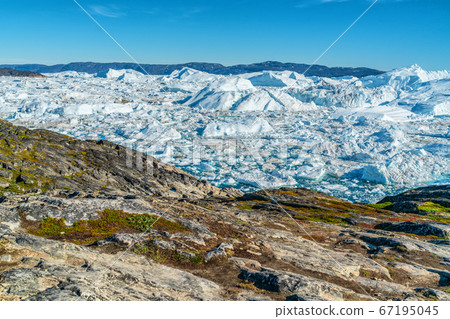 Icebergs from melting glacier in icefjord - Global Warming and Climate Change Icebergs from melting glacier in icefjord - Global Warming and Climate Change 67195045