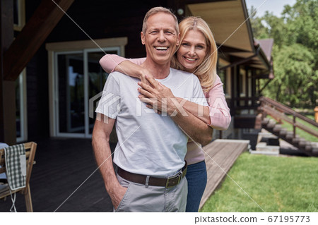 Happy mature couple having fun in nature 67195773