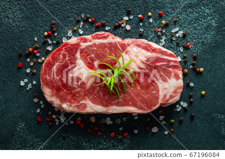 Raw fresh meat Ribeye Steak and seasoning. Raw fresh meat Ribeye Steak and seasoning. 67196084