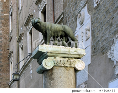 Sculpture of a mother-wolf feeding Romulus and Remus, Rome, Italy 67196211