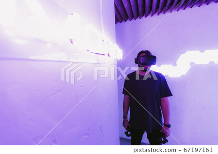 Mixed Reality MR . Man is connected to digital reality. Cyber room. 67197161