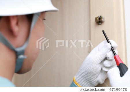 Repairer who maintains the storage door Repairer who maintains the storage door 67199478