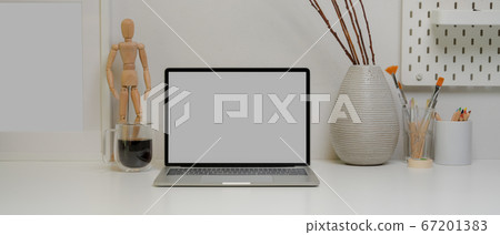Modern home worktable with mock-up laptop, coffee 67201383