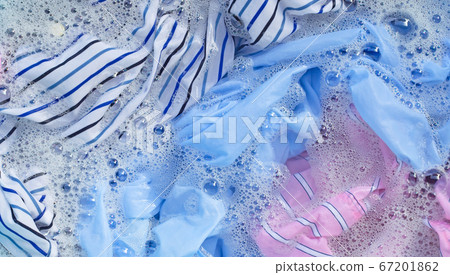 Color clothes soak in powder detergent water 67201862