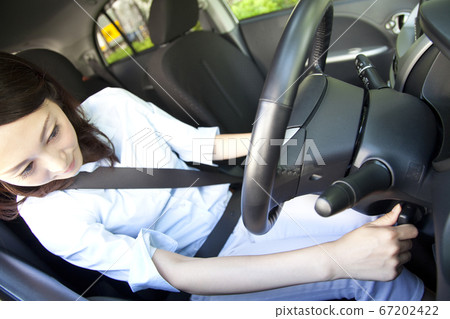 Women driving Women driving 67202422