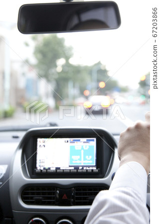 Electric car driving 67203866