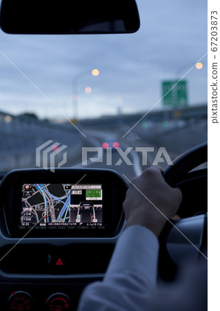 Electric car driving 67203873