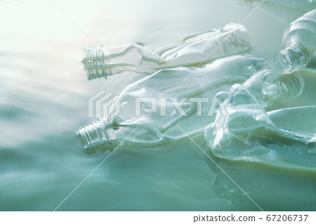 Plastic bottle floating on the water Plastic bottle floating on the water 67206737