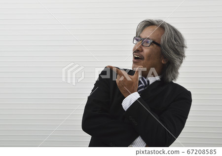 Happy elderly asian businessman in black suit and Happy elderly asian businessman in black suit and 67208585
