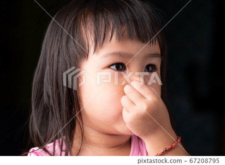 Portrait face of Asian little child girl holding 67208795