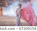Woman wearing typical thai dress with thai style, Beauty fantasy Thai dress traditional costume on brick in old temple 67209158