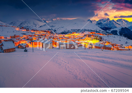 Majestic sunset and ski resort in the French Alps, Europe 67209504