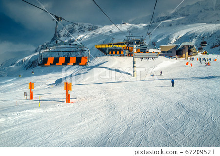 Ski slopes with comfortable fast cable cars in French Alpes Ski slopes with comfortable fast cable cars in French Alpes 67209521