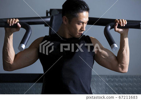 Men training in the gym Men training in the gym 67211683