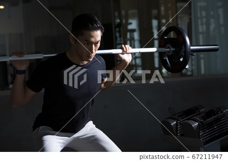 Men training in the gym Men training in the gym 67211947