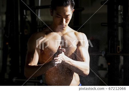 Men training in the gym 67212066