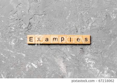 examples word written on wood block. examples text 67218062