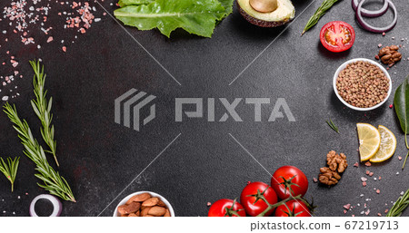 Composition of spices and herbs on a dark concrete Composition of spices and herbs on a dark concrete 67219713