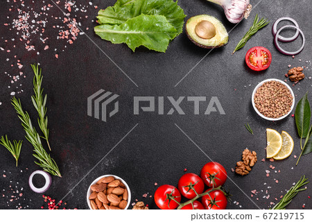 Composition of spices and herbs on a dark concrete Composition of spices and herbs on a dark concrete 67219715