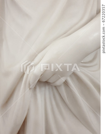 Fragment of a woman hand of an old sculpture Fragment of a woman hand of an old sculpture 67220357