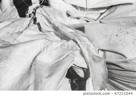White canvas membrane plastic bags with trash White canvas membrane plastic bags with trash 67221044