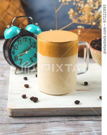 Whipped dalgona coffee drink in glass mug Whipped dalgona coffee drink in glass mug 67222893