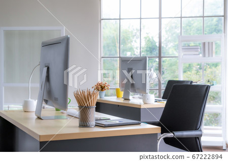 Desktop PC computers in small modern office or home office. 67222894