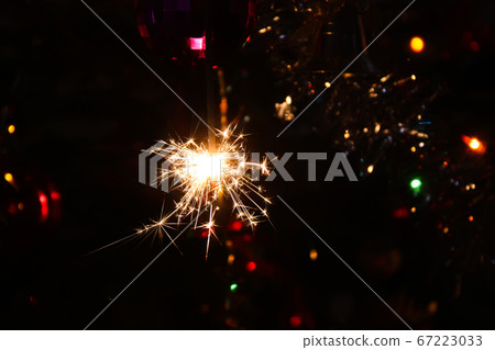 Bengali fire. Festive firework salute burst. 67223033