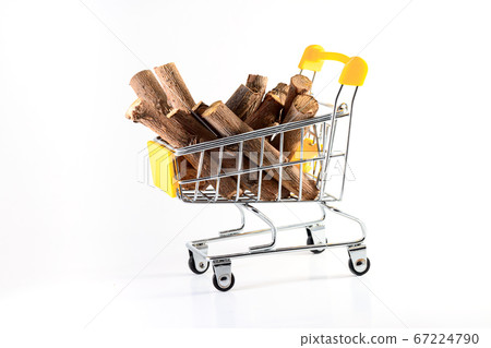 logging - pile of firewood in supermarket trolley cart consumer basket logging - pile of firewood in supermarket trolley cart consumer basket 67224790