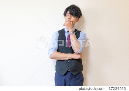 A member of society who rolls a suit and thinks 67224933