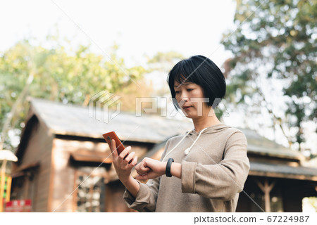 using smart watch and mobile phone using smart watch and mobile phone 67224987
