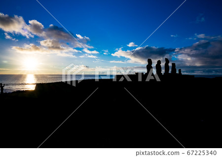 Ahu Tahai moai platform high contrast at sunset 67225340