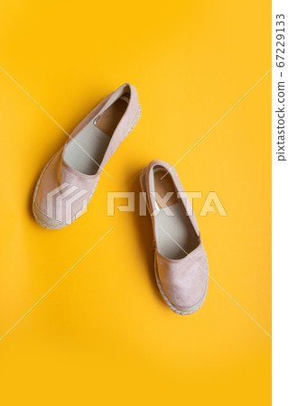 Stylish new shoes on a colored background, top view. Top view, flat lay. Beauty blog concept. Stylish new shoes on a colored background, top view. Top view, flat lay. Beauty blog concept. 67229133