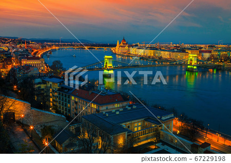 Beautiful Chain bridge and Parliament building at sunset, Budapest, Hungary 67229198