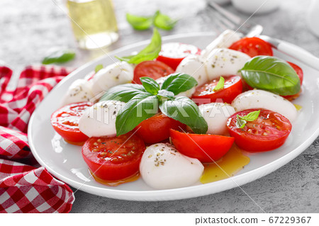 Caprese salad. Salad with mozzarella cheese fresh Caprese salad. Salad with mozzarella cheese fresh 67229367