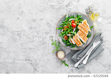 Chicken fillet salad with fresh vegetables and 67229384