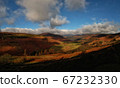 Picturesque mountain valley in sunset tones 67232330