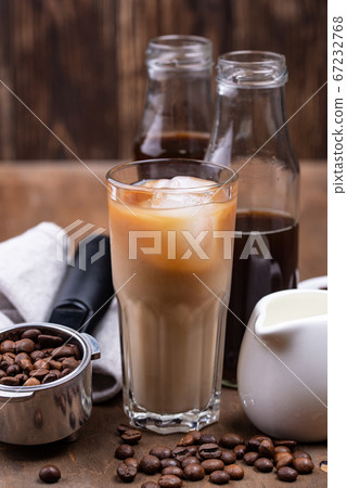 Cold brew coffee with ice and milk Cold brew coffee with ice and milk 67232768