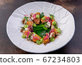 Smoked mackerel with tartar sauce and pea cream on a white plate. European cuisine. The work of a 67234803