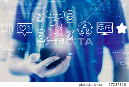 Social media theme with man using a smartphone 67237116