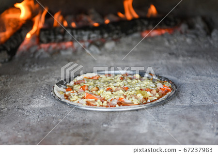 Pizza baked in oven - homemade pastry pizza 67237983