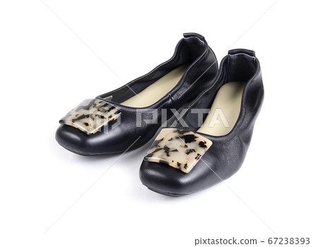black ladies' flat shoes on white background. 67238393