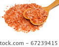 Pink Himalayan salt on a wooden spoon isolated on white background. 67239415