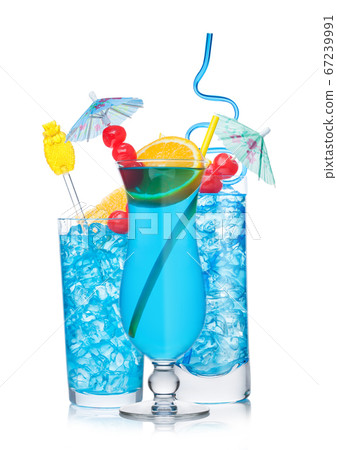 Blue lagoon cocktail glasses with straw and orange 67239991