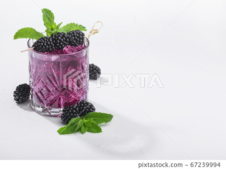 Glass of refreshing summer cocktail with 67239994