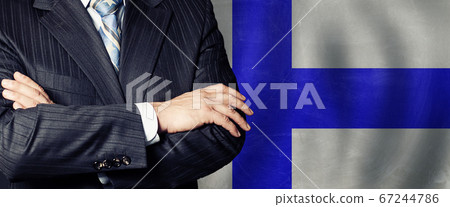 Male hands against Finnish flag background, Male hands against Finnish flag background, 67244786