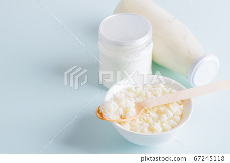 Milk mushroom organic probiotic fermented milk products glass bowl. Fermented foods healthy eating concept. Copy space. Milk mushroom organic probiotic fermented milk products glass bowl. Fermented foods healthy eating concept. Copy space. 67245118