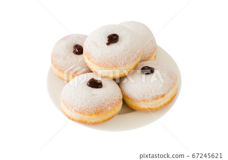 Traditional sweet donuts with powdered sugar and jam. Fat Thursday or Hanukkah celebration. Traditional sweet donuts with powdered sugar and jam. Fat Thursday or Hanukkah celebration. 67245621
