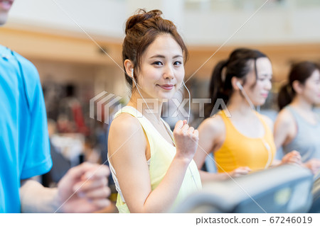 Young woman, gym, running machine Young woman, gym, running machine 67246019