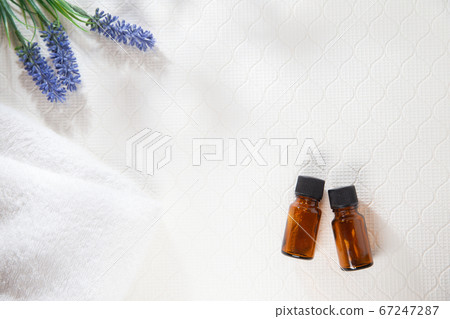Two bottles of aroma and aroma oil. Lavender, relax, beauty image. 67247287